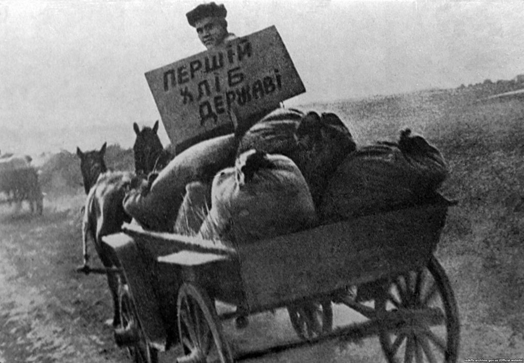 Bread taken from people. On the poster it’s written “first bread to the state” Source: RFE/RL